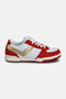 Linebacker trainer side view in white, red and gold – white mesh upper with red suede overlays and rugged turf outsole.