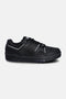 M-100 Low sneaker side view in black – full‑grain leather upper with mesh air vent insert, black overlays, PONY chevron and chunky rubber sole.